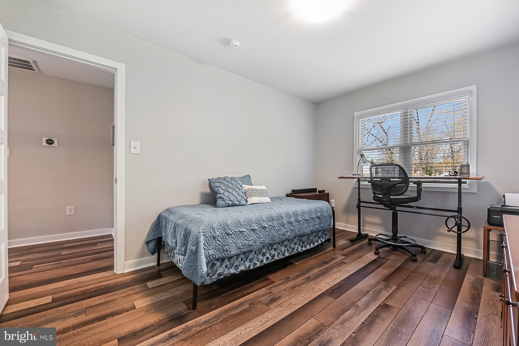 609 Riverside Drive Pasadena, MD 21122 - Photo 41 of 48 Luxury vinyl flooring in 3rd bedroom