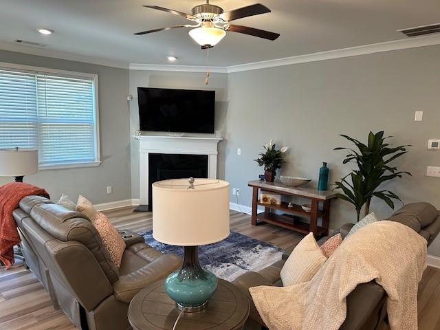 513 Forest Lane Canton, GA 30114 - Photo 14 of 54 a living room with furniture a flat screen tv and a fireplace