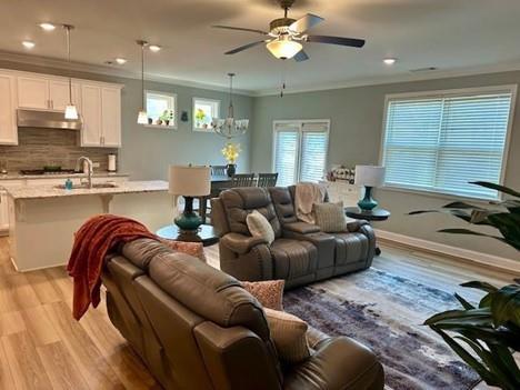 513 Forest Lane Canton, GA 30114 - Photo 18 of 54 a living room with furniture and a large window