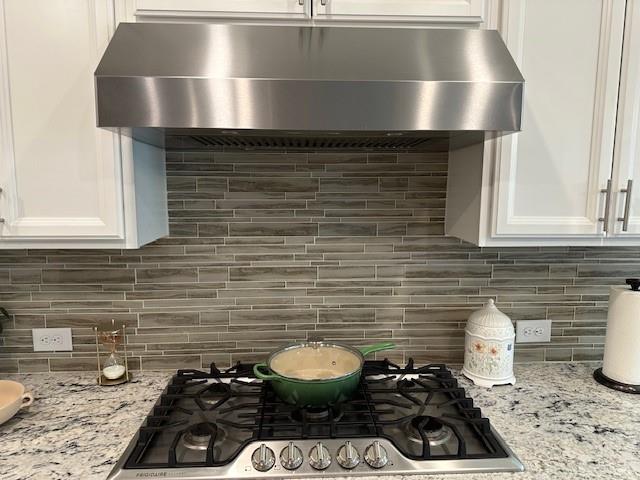 513 Forest Lane Canton, GA 30114 - Photo 24 of 54 a kitchen with a stove and a cabinets