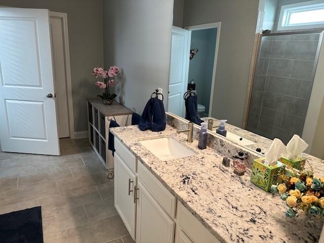 513 Forest Lane Canton, GA 30114 - Photo 29 of 54 a bathroom with a granite countertop sink and a mirror