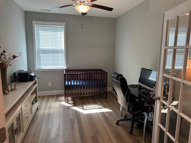513 Forest Lane Canton, GA 30114 - Photo 37 of 54 a view of a workspace with furniture and a window