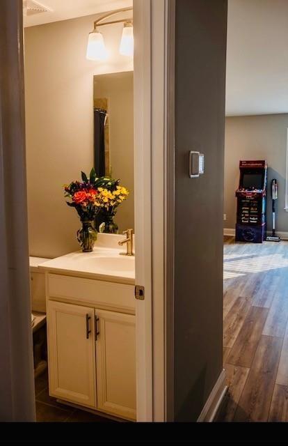 513 Forest Lane Canton, GA 30114 - Photo 47 of 54 a bathroom with a sink and a mirror