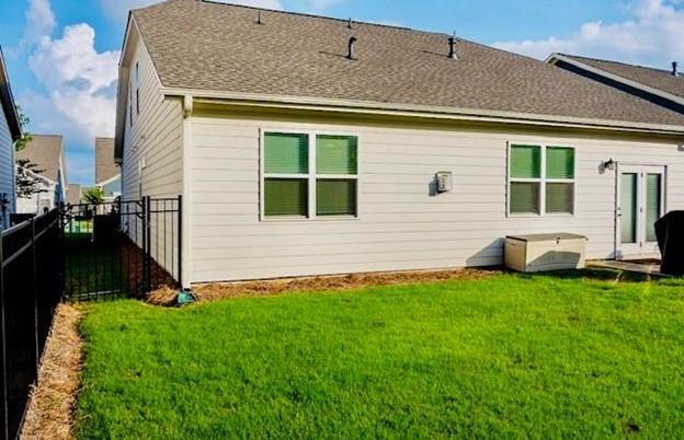513 Forest Lane Canton, GA 30114 - Photo 51 of 54 a view of a house with a yard