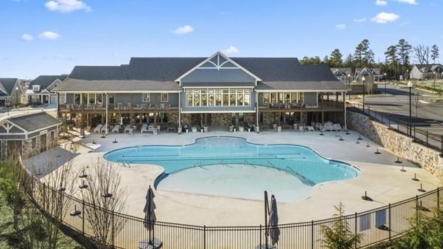 513 Forest Lane Canton, GA 30114 - Photo 53 of 54 a view of a house with a swimming pool