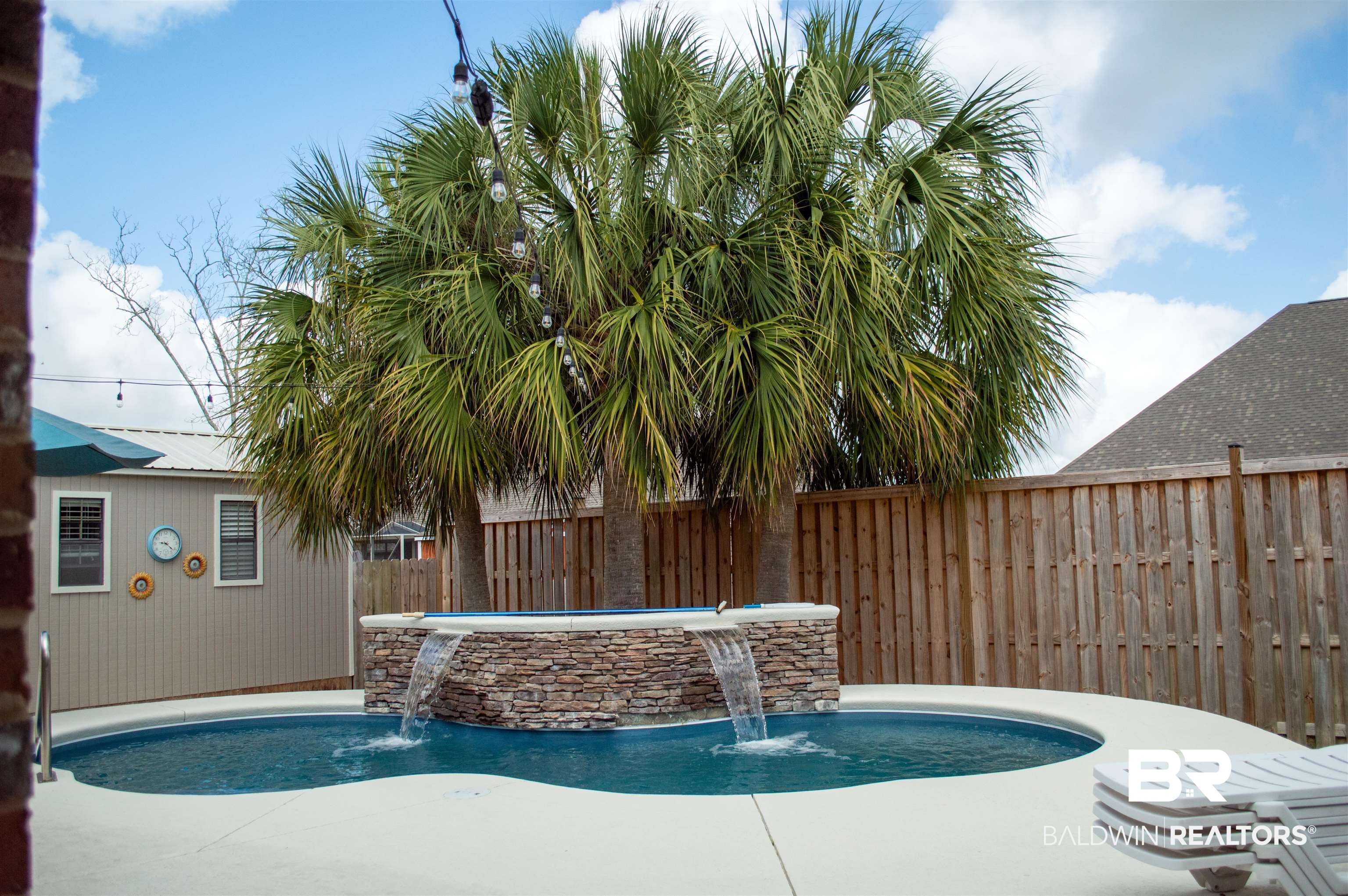 1124 West Orlando Drive Foley, AL 36535 - Photo 47 of 51 View of swimming pool with a fenced backyard and patio surround