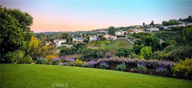 wooden floor in a hall with a mirror