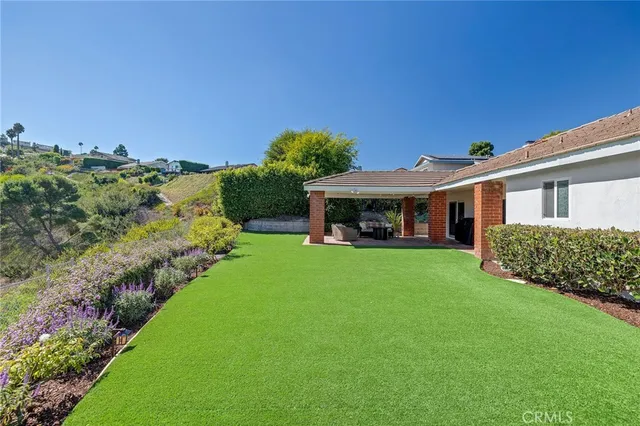 a living room with furniture fireplace and flat screen tv