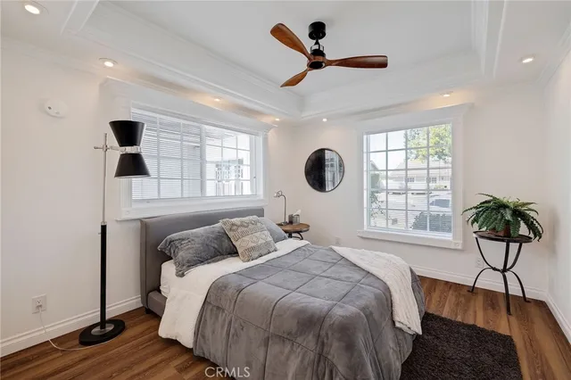 a spacious bathroom with a double vanity sink and a mirror