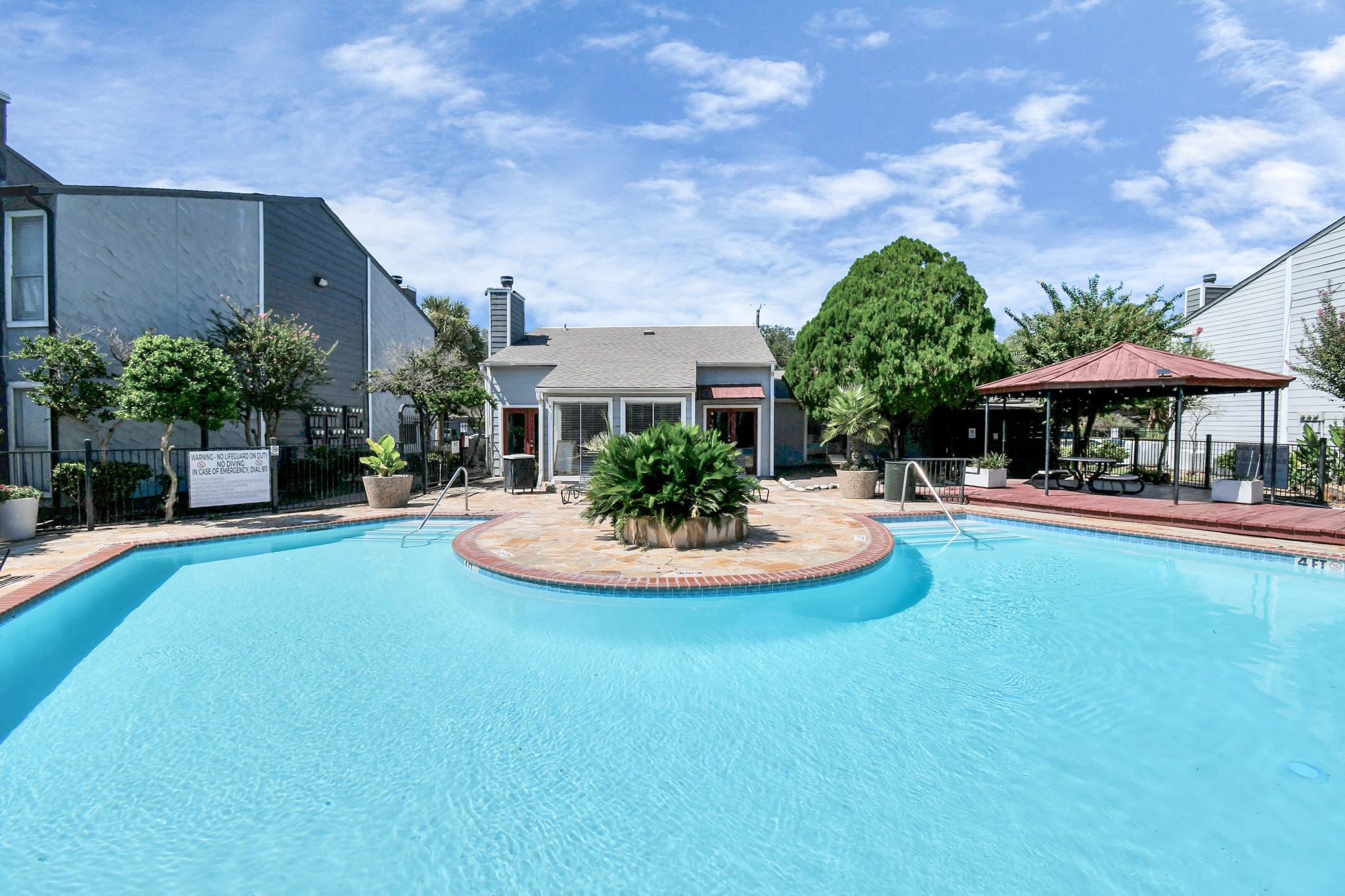5959 Bonhomme Road, Unit 192R Houston, TX 77036 - Photo 10 of 26 a view of a house with swimming pool and sitting area