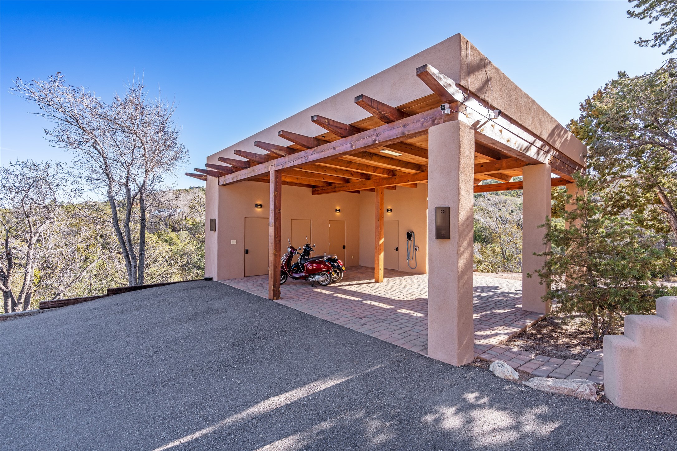 1204 Bandolina Road Santa Fe, NM 87501 - Photo 61 of 69 Carport with storage closets and EV charging
