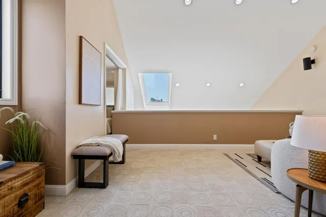 a front view of a multi story residential apartment building with a yard