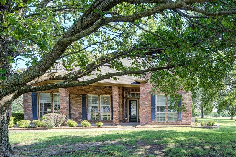 334 Farm To Market Road 2264 Decatur, TX 76234 - Photo 9 of 40 front view of a brick house with a yard