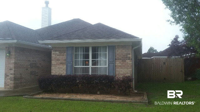 8451 Kendall Court Mobile, AL 36695 - Photo 4 of 33 This charming brick home has been meticulously maintained.