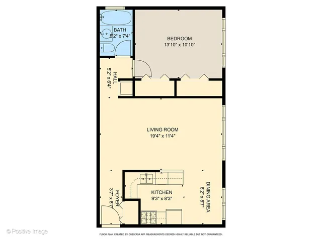 a picture of a bench in front of a wall