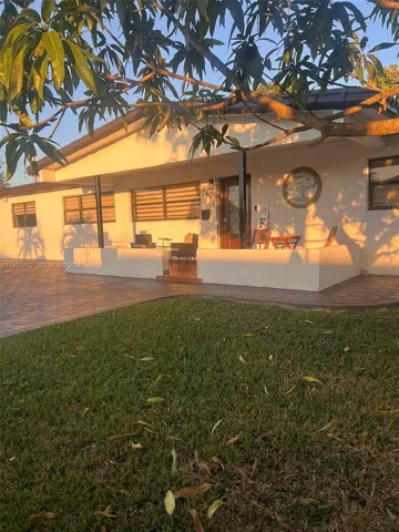 a view of yard with swimming pool