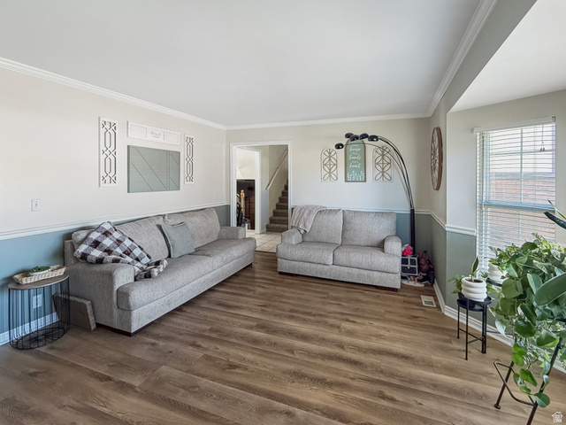 1716 Sagewood Road Price, UT 84501 - Photo 5 of 73 Living room featuring wood finished floors and crown molding