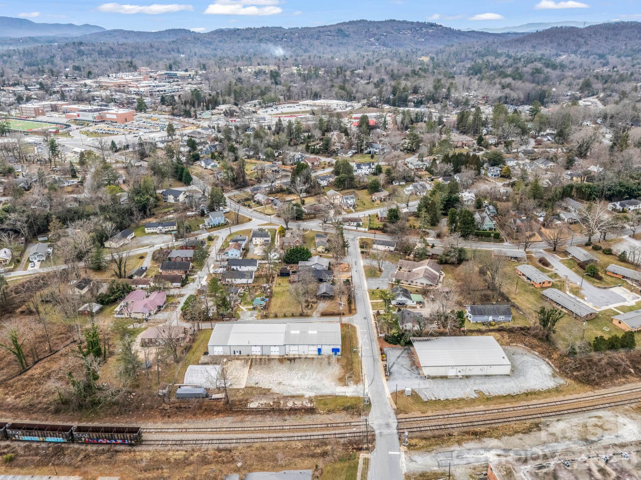 0 Ray Avenue Hendersonville, NC 28792 - Photo 15 of 18 an aerial view of residential houses with outdoor space