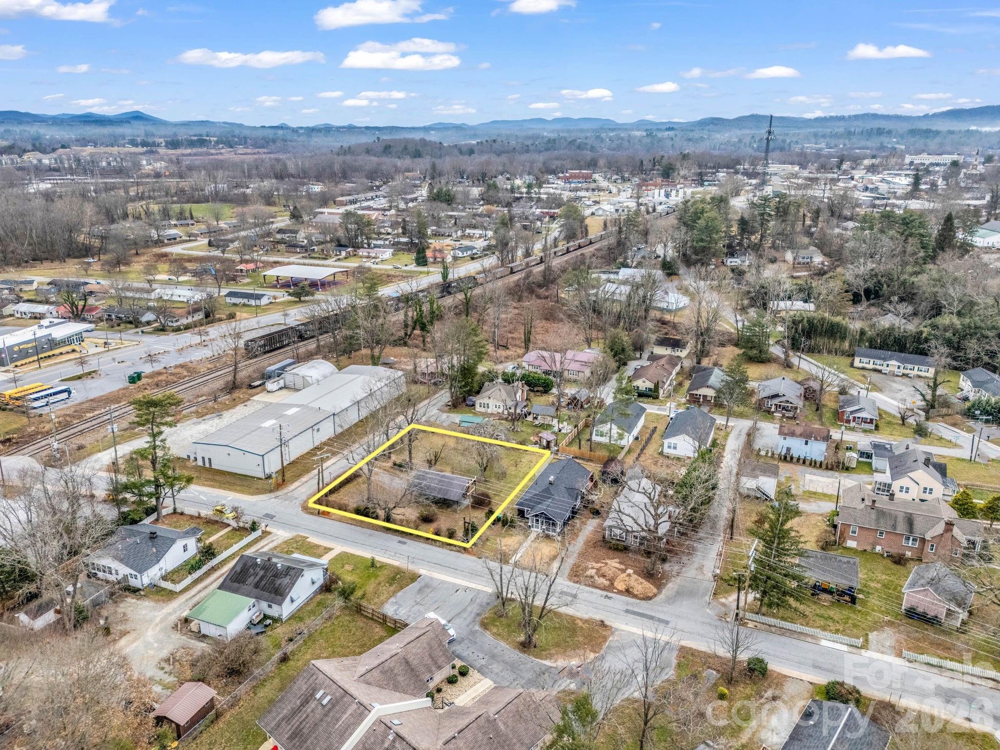 0 Ray Avenue Hendersonville, NC 28792 - Photo 7 of 18 an aerial view of residential houses with outdoor space