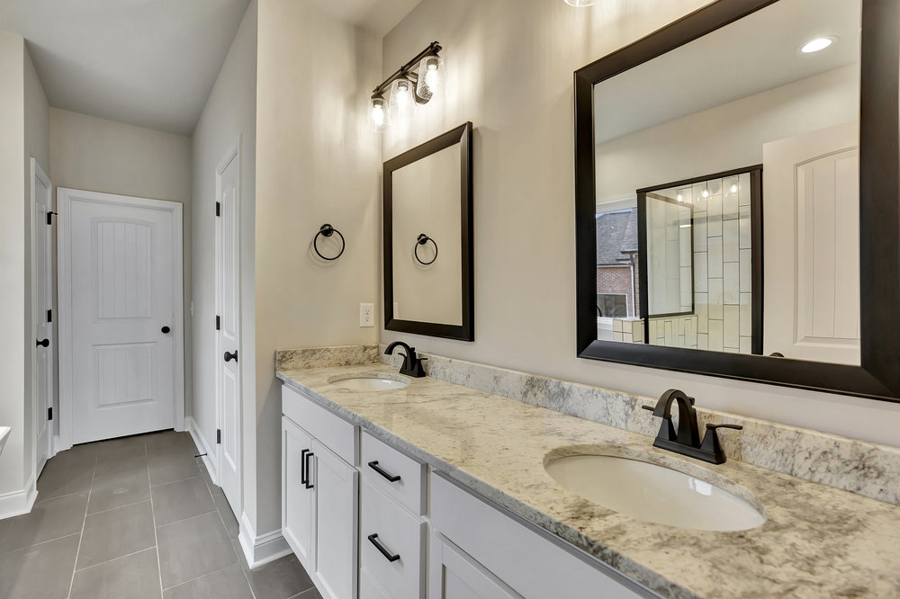 118 Bonaire Point Anderson, SC 29621 - Photo 3 of 23 This spacious bathroom offers a double vanity with ample counter space and modern fixtures.
