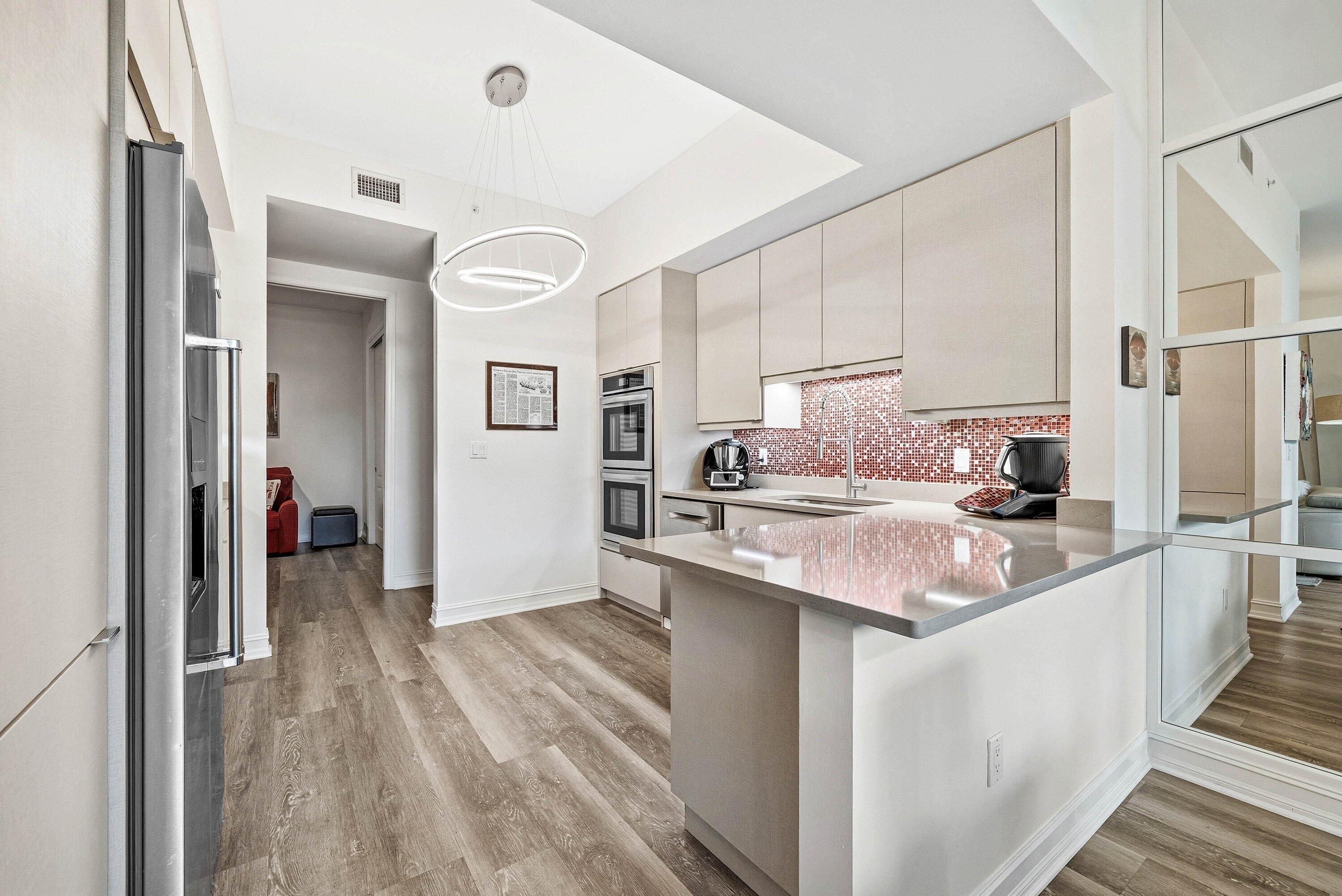 550 Southeast Mizner Boulevard, Unit B110 Boca Raton, FL 33432 - Photo 16 of 53 Renovated Kitchen