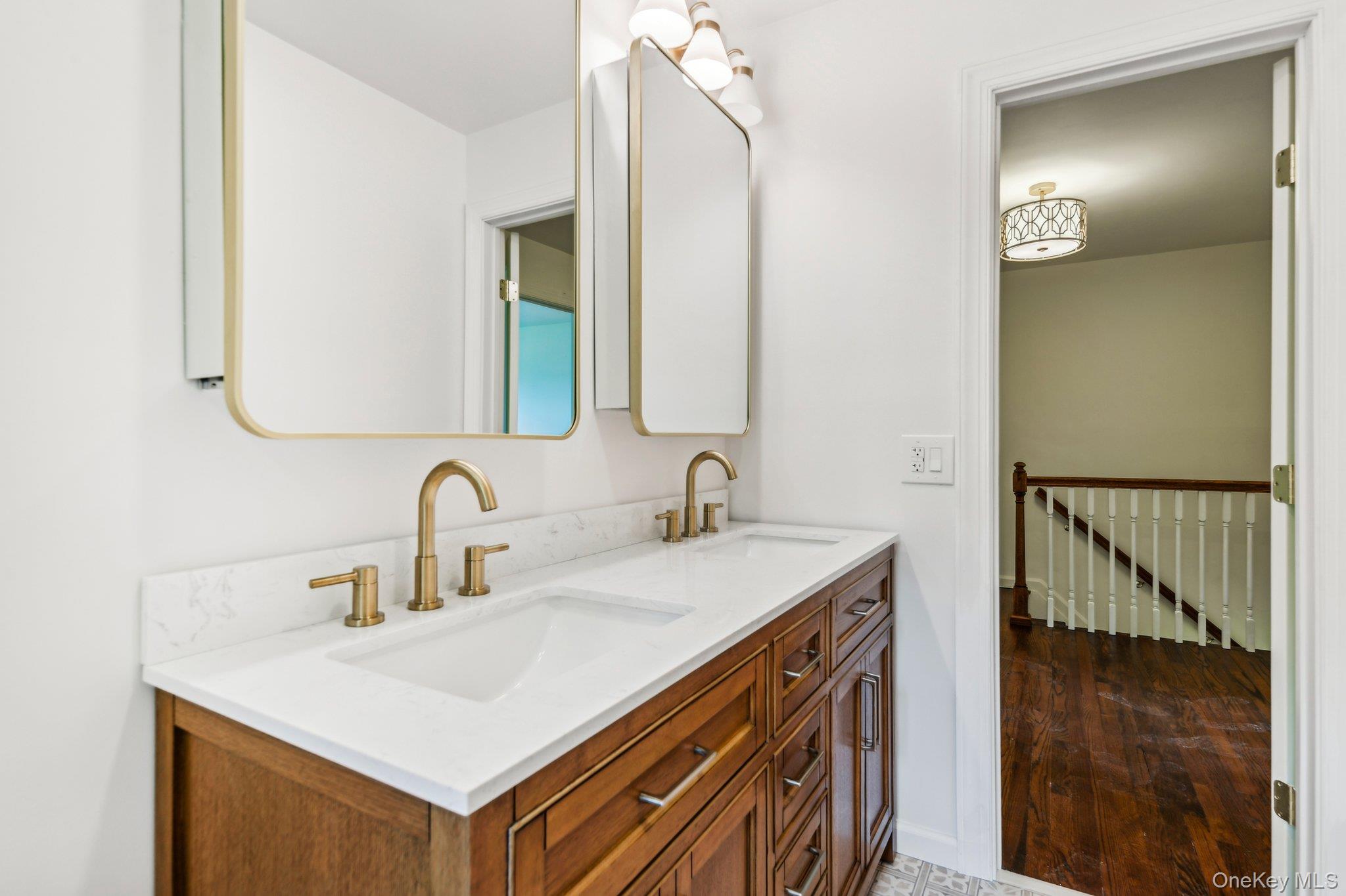 8 Mill Lot Road Middle Island, NY 11953 - Photo 11 of 20 a bathroom with a sink and a mirror