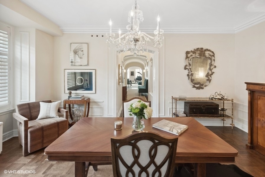 222 East Chestnut Street, Unit 17B Chicago, IL 60611 - Photo 8 of 29 a view of a dining room with furniture