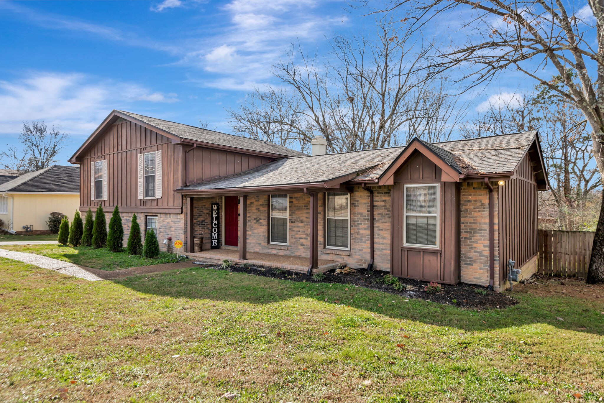 a front view of a house with garden