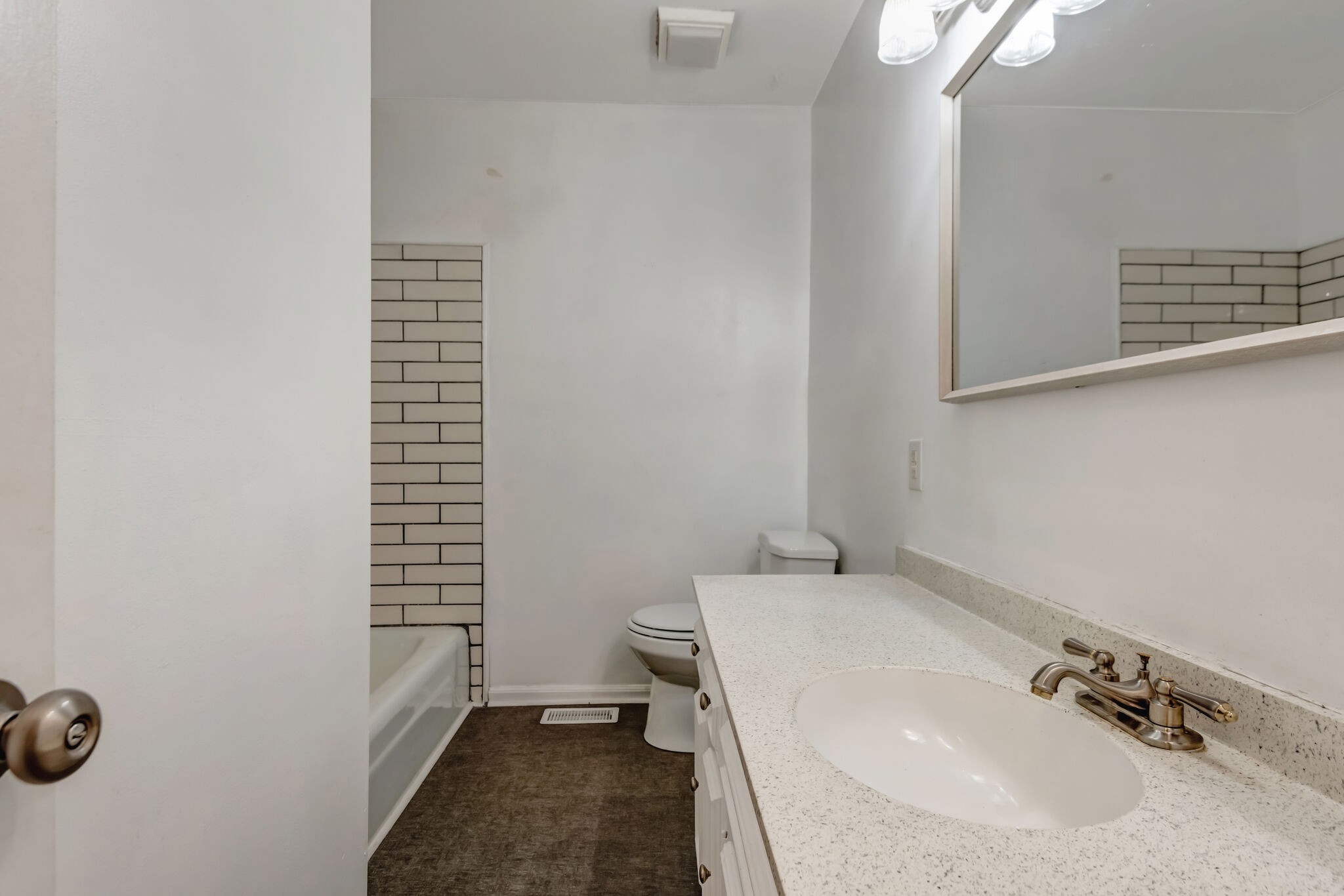 561 Castlegate Drive Nashville, TN 37217 - Photo 13 of 21 a bathroom with a sink and a toilet