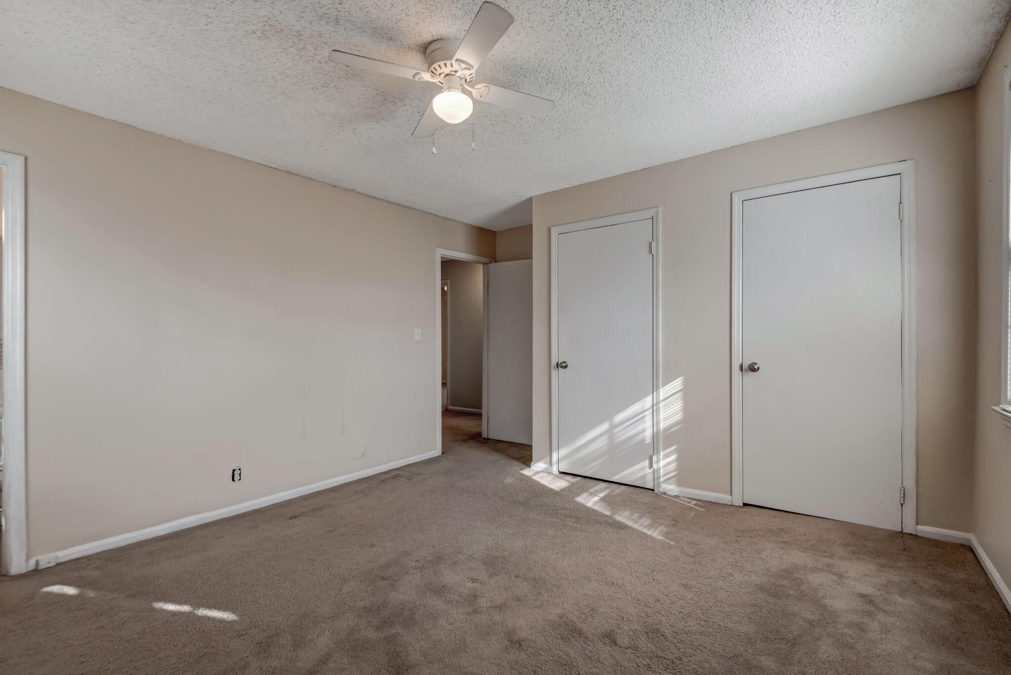 561 Castlegate Drive Nashville, TN 37217 - Photo 14 of 21 an empty room with closet and a ceiling fan
