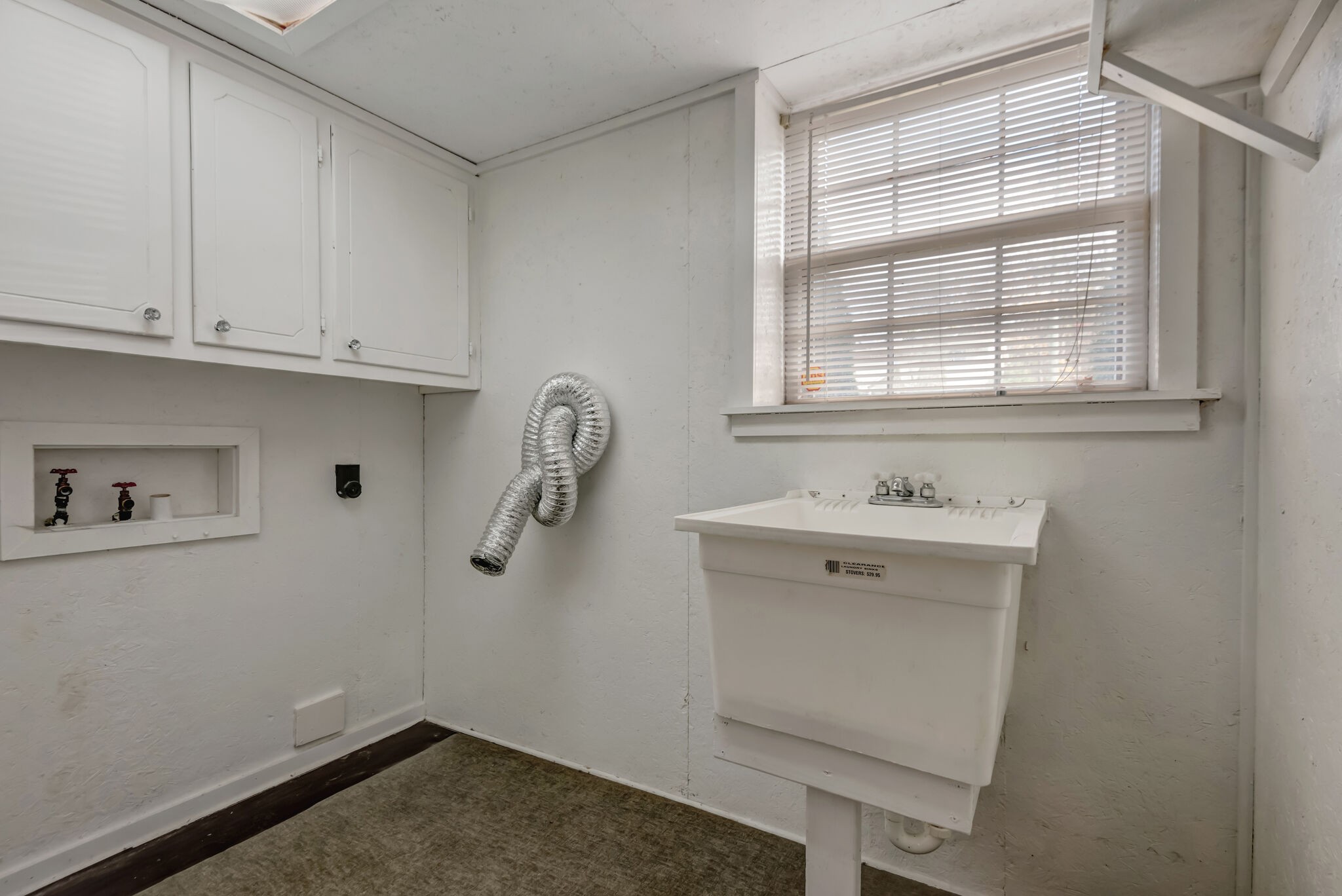 561 Castlegate Drive Nashville, TN 37217 - Photo 16 of 21 a bathroom with a sink and cabinets