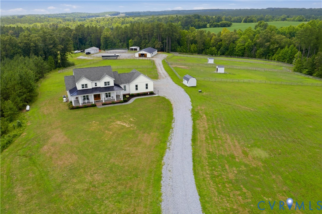 25181 West Soap Stone Road Jetersville, VA 23083 - Photo 45 of 54 Expansive property featuring a white residence wit