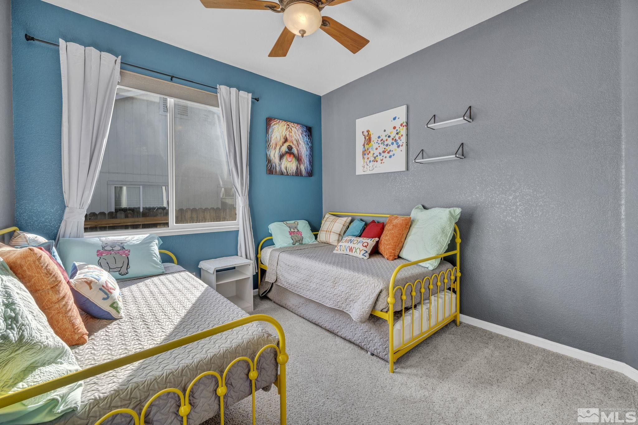 4805 Crestside Drive Sparks, NV 89436 - Photo 21 of 33 a living room with furniture and a window