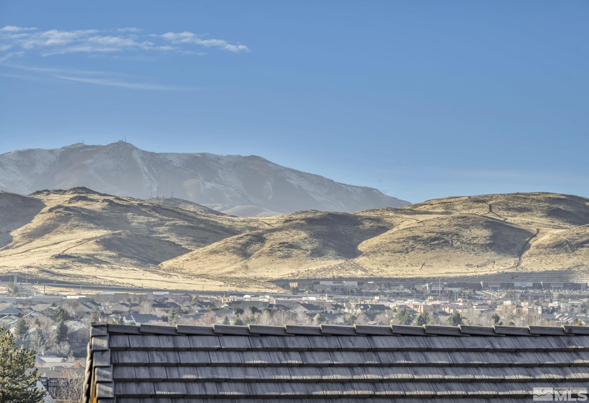 4805 Crestside Drive Sparks, NV 89436 - Photo 23 of 33 a view of a fireplace with a mountain