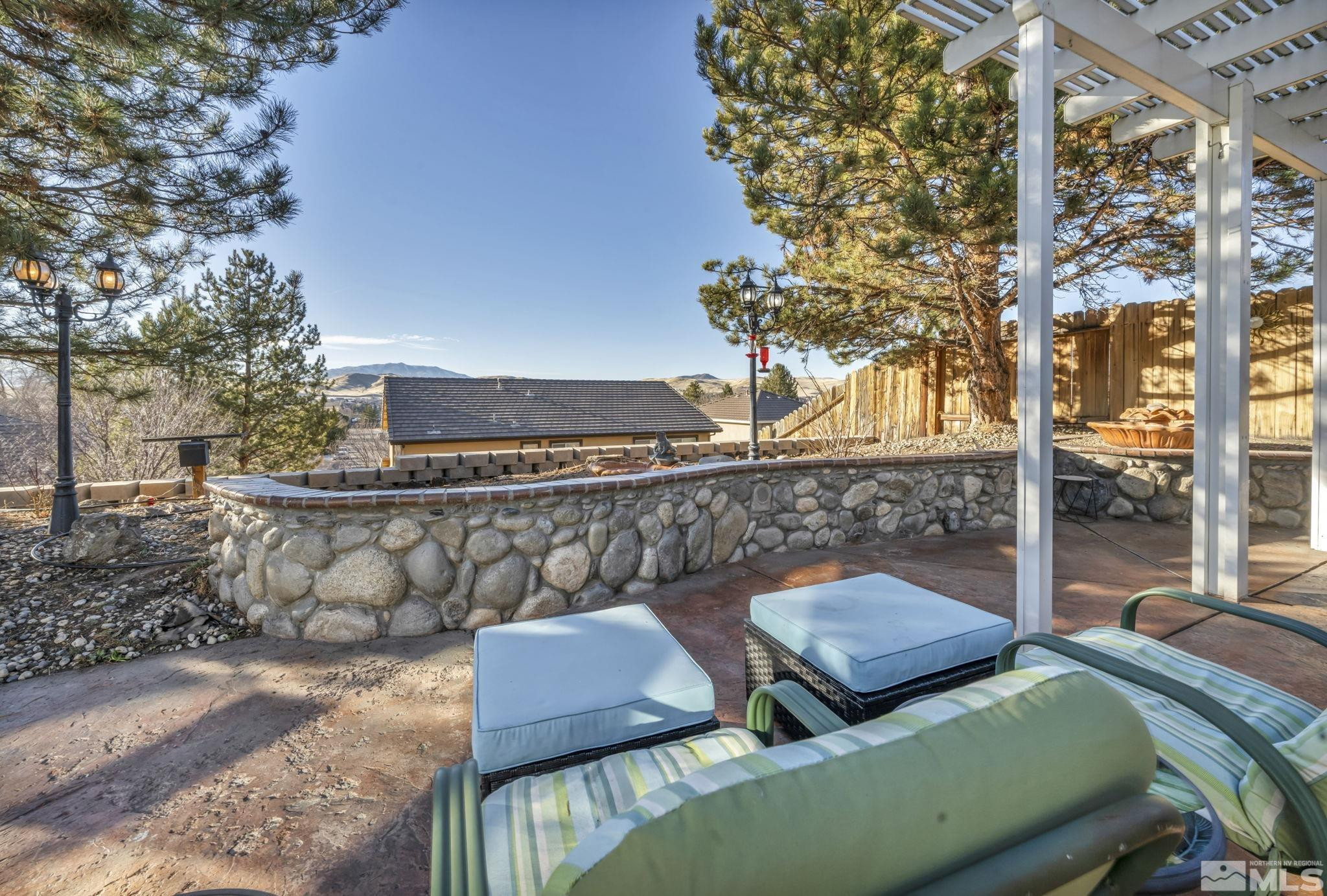 4805 Crestside Drive Sparks, NV 89436 - Photo 27 of 33 a view of a couches in the patio