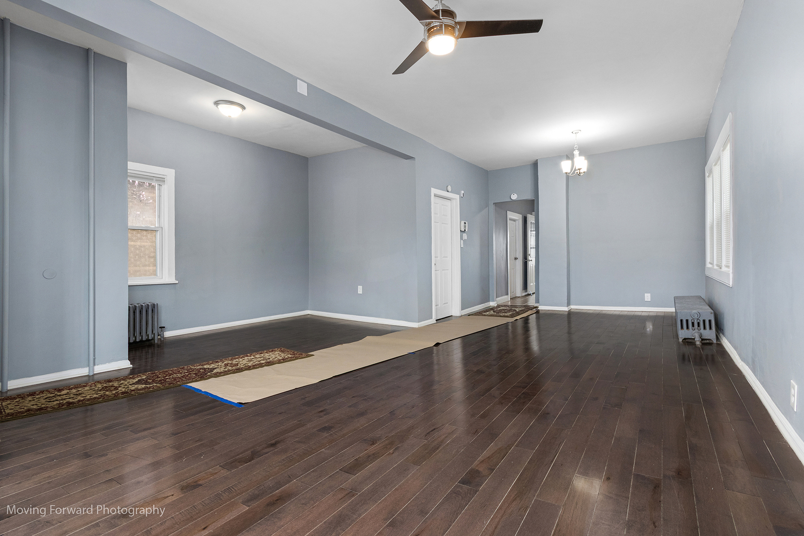 11945 South State Street Chicago, IL 60628 - Photo 2 of 16 a view of an empty room with wooden floor