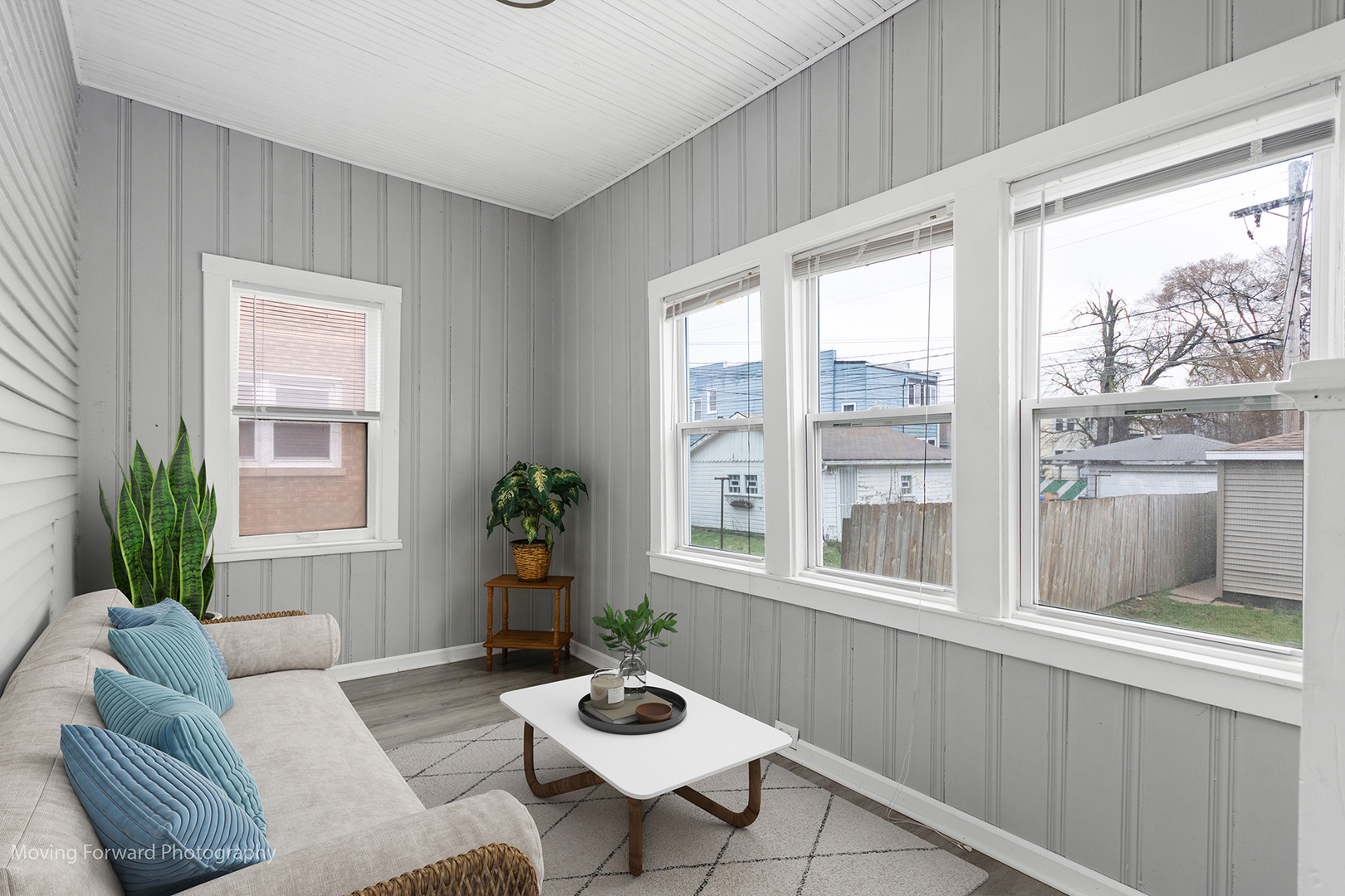11945 South State Street Chicago, IL 60628 - Photo 6 of 16 a living room with furniture and a large window