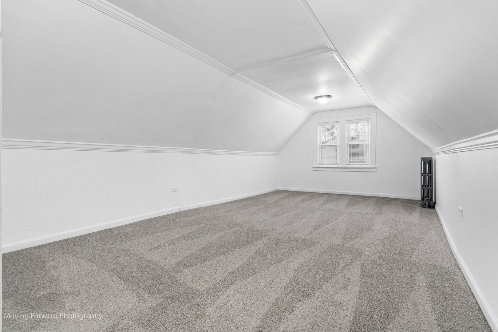 11945 South State Street Chicago, IL 60628 - Photo 8 of 16 an empty room with a empty space and windows