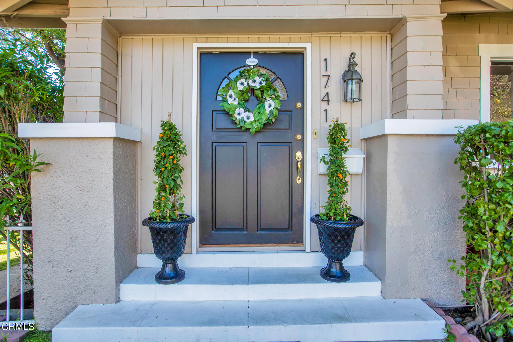 1741 Mission Street South Pasadena, CA 91030 - Photo 2 of 51 a view of a entryway door of the house with potted plants