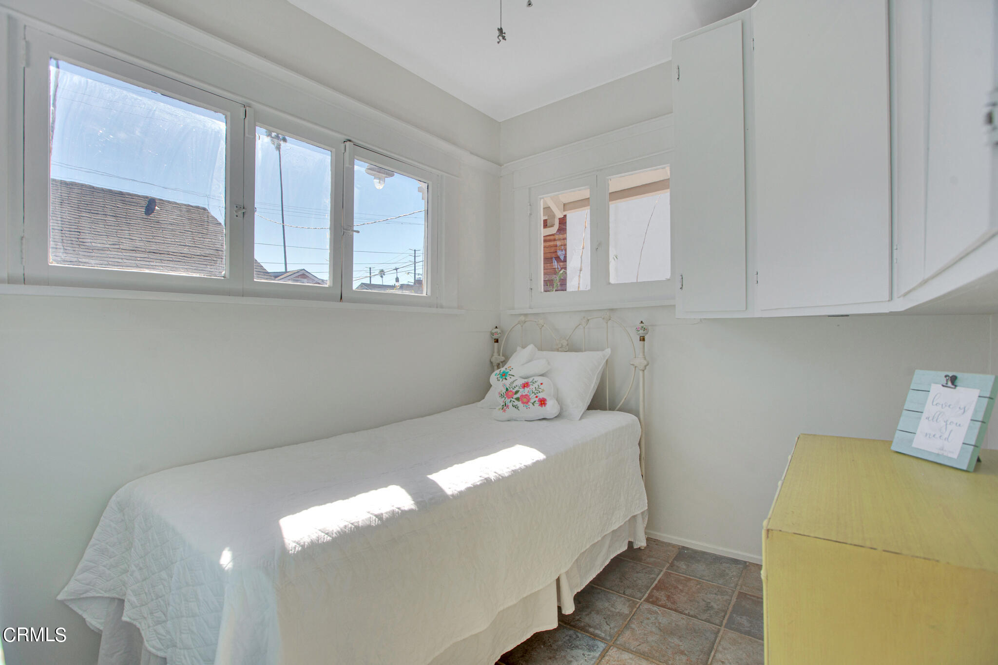 1741 Mission Street South Pasadena, CA 91030 - Photo 22 of 51 a bedroom with a bed and window