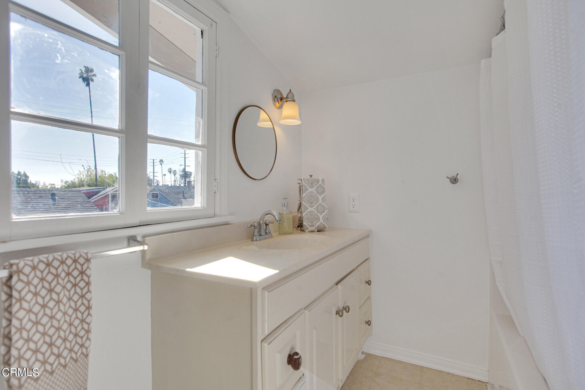 1741 Mission Street South Pasadena, CA 91030 - Photo 31 of 51 a bathroom with a sink and a mirror