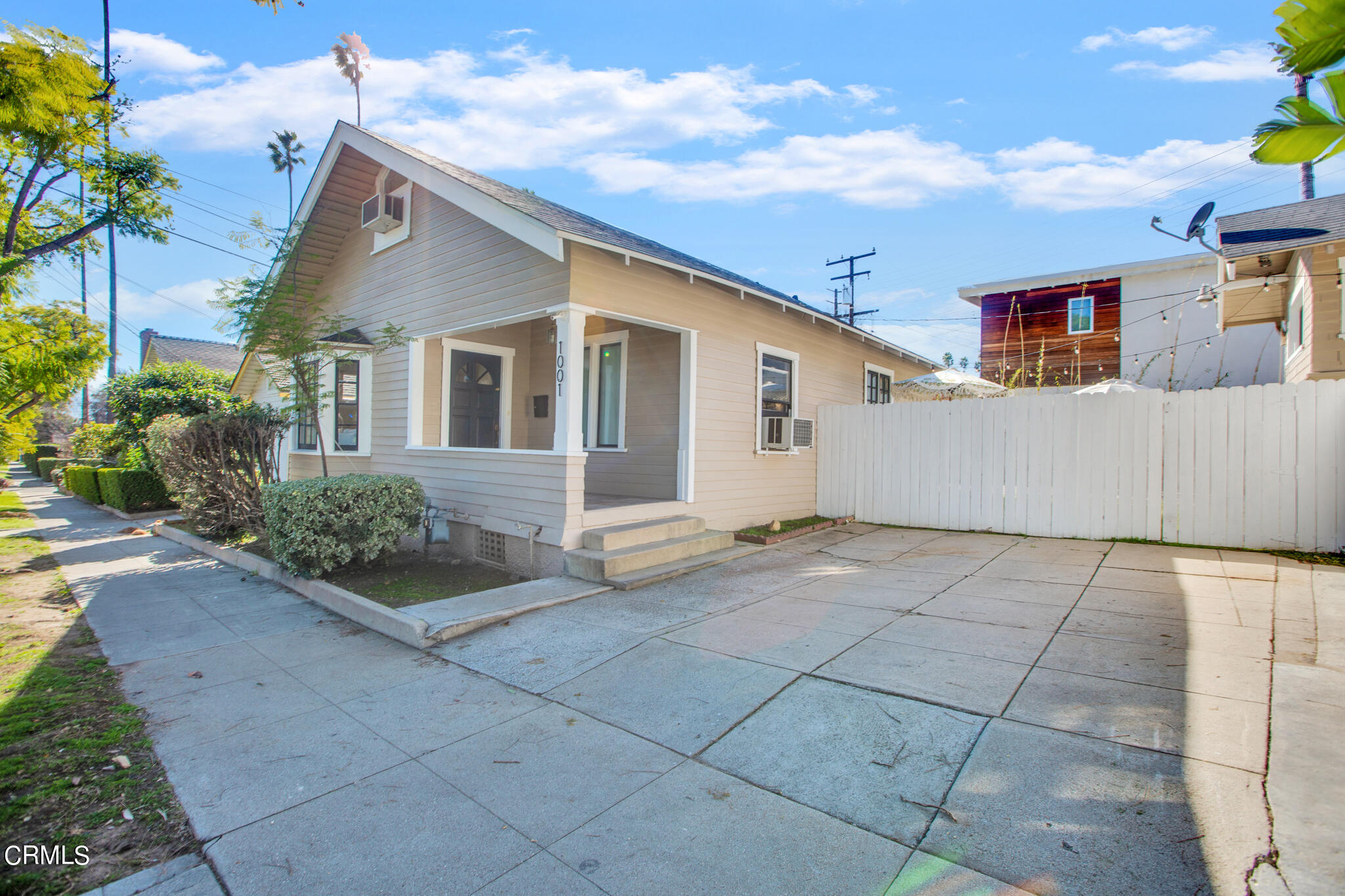 1741 Mission Street South Pasadena, CA 91030 - Photo 42 of 51 a view of a white house with a yard and plants