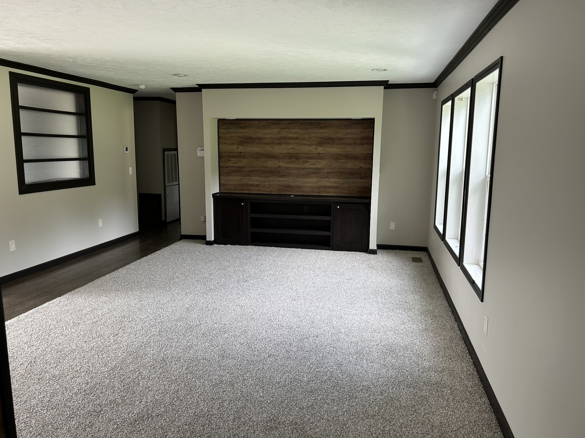 1762 Walden Ridge Road Manchester, TN 37355 - Photo 2 of 12 a view of an empty room with a fireplace and a window