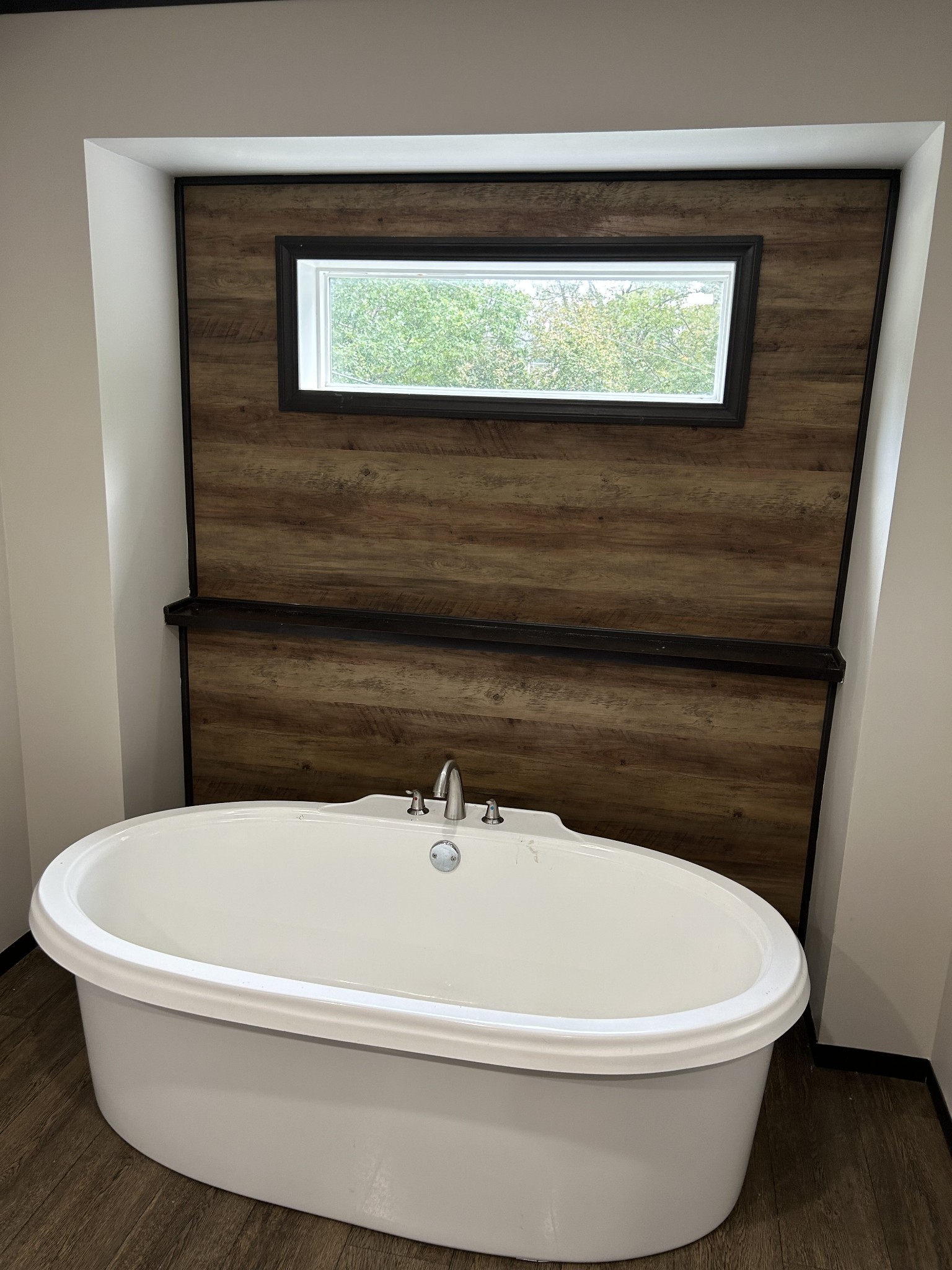 1762 Walden Ridge Road Manchester, TN 37355 - Photo 7 of 12 a white bath tub sitting in a bathroom