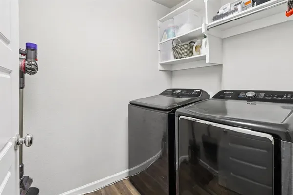 a utility room with dryer and washer