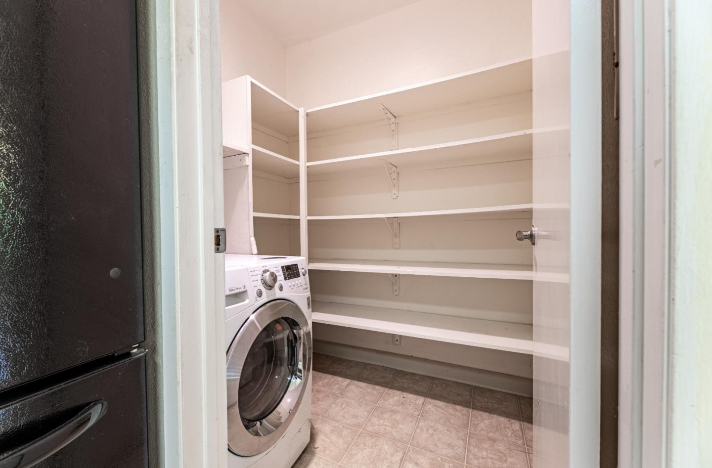 1055 North Capitol Avenue, Unit 51 San Jose, CA 95133 - Photo 9 of 23 a utility room with washing machine