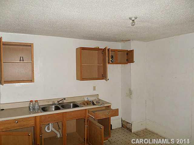 1705 Beatties Ford Road Charlotte, NC 28216 - Photo 3 of 6 a room with storage and utility