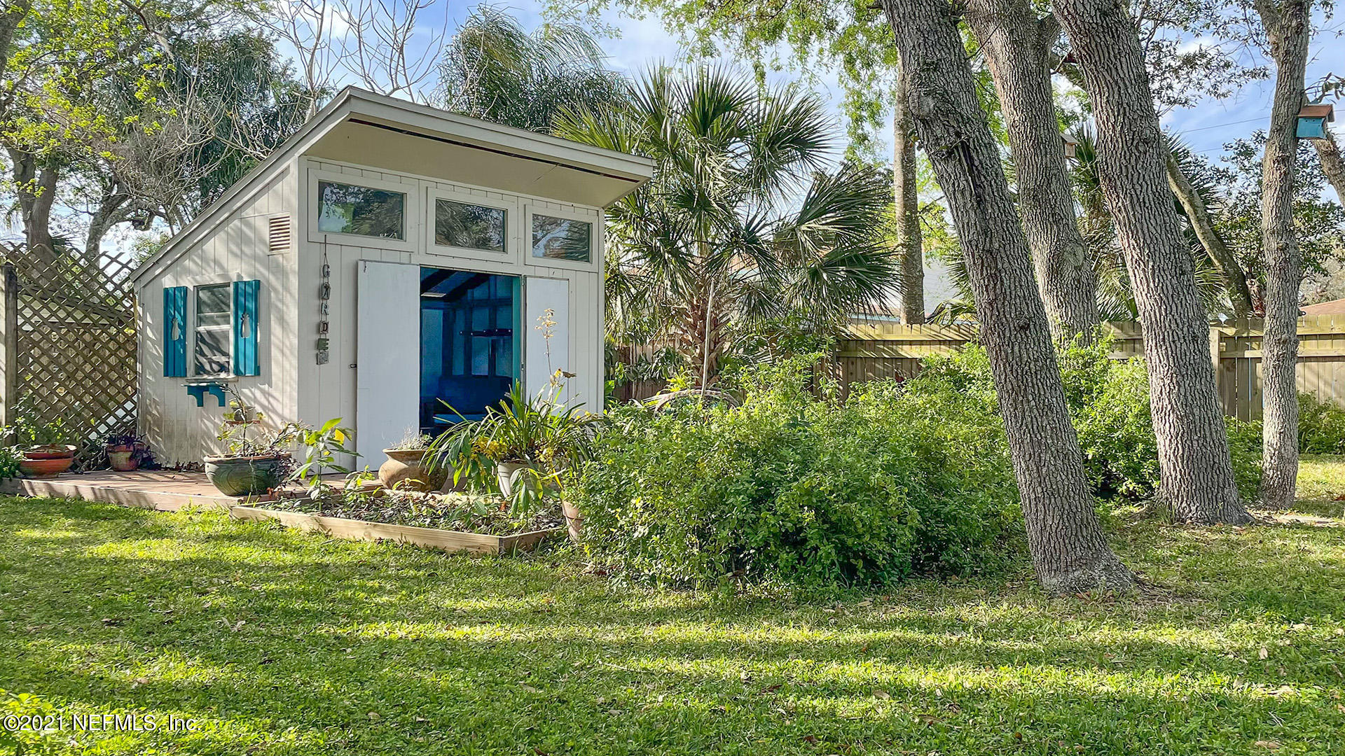 1756 Riley Street Jacksonville Beach, FL 32250 - Photo 9 of 29 009_Lushly Landscaped Backyard