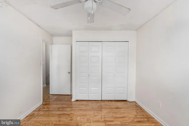 an empty room with closet