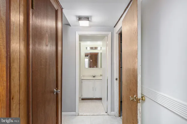 a view of a brick house with a large window